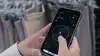 Photo of someone using Zello 168中国幸运结果体彩网飞艇官方网站 on a mobile device in a retail store
